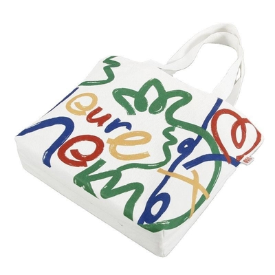 Bolsa de compras de lienzo de color personalizada de gran capacidad con diseño y logotipo de cara sonriente