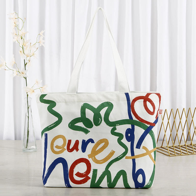 Bolsa de compras de lienzo de color personalizada de gran capacidad con diseño y logotipo de cara sonriente