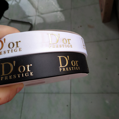 Aceptado OEM Personalizado de papel de oro Impreso 3D Logotipo de poliéster cinta de satén para envoltura de regalos