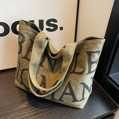 Bolso de toque de las axilas femeninas transfronterizo con letra explosiva y gran capacidad