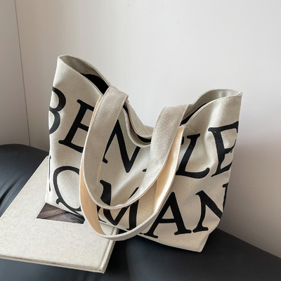 Bolso de toque de las axilas femeninas transfronterizo con letra explosiva y gran capacidad